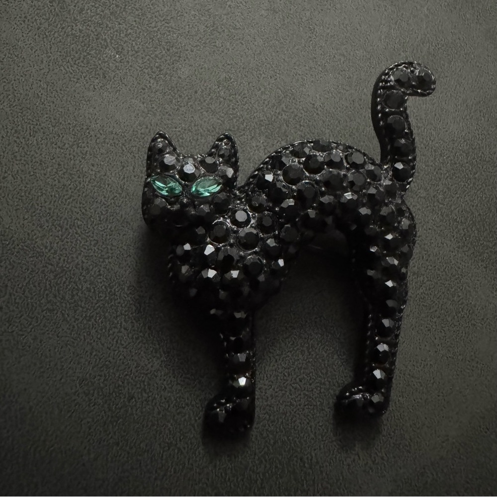 Monet Black Crystal Cat Pin with Emerald Green Eyes